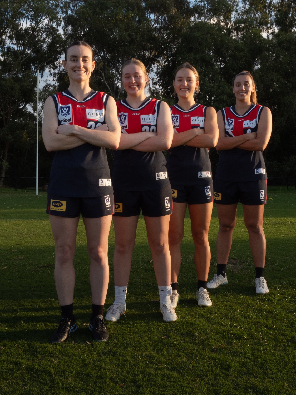 Darebin Falcons 2026 VFLW senior leaders and emerging leader smiling on the oval